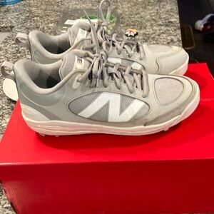 Grey white cleats size 6.5 boys new balance